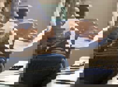 persons holding documents, calculator